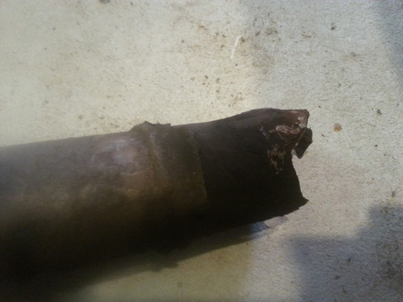 Broken piece at manifold. Notice how it was already broke from a previous repair.